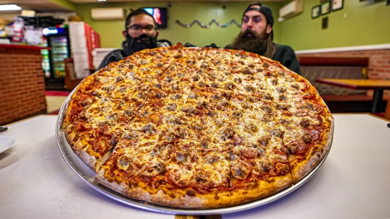 Thumbnail for the Massive Pizza Challenge at Five Guys Flippin' Pies video