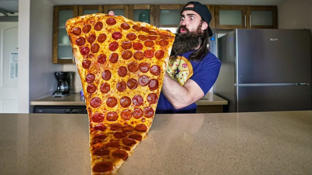 Thumbnail for the Giant Pizza Slice Challenge at Lamanna's Bakery video