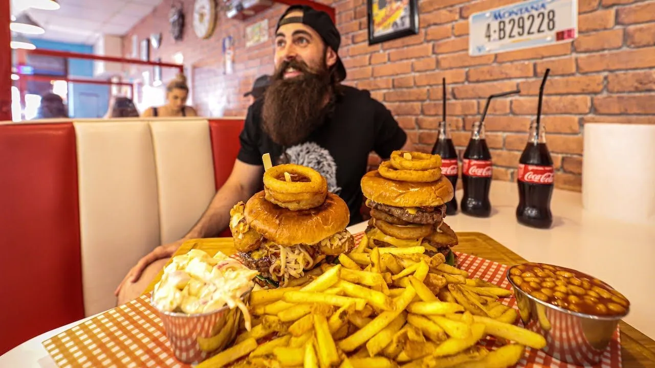 Thumbnail for the Twin Stack Burger Challenge at Route 15 American Diner video