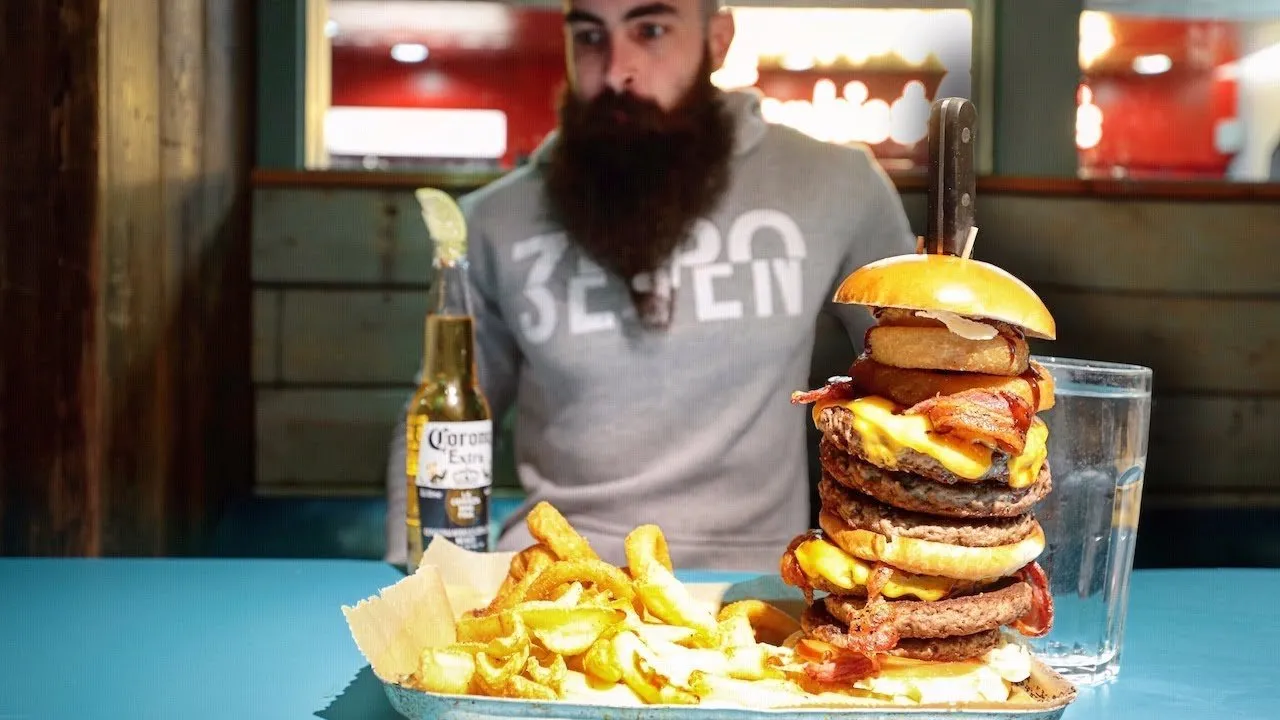 Thumbnail for the Burger Challenge at Giraffe's Burgers & Cocktails video