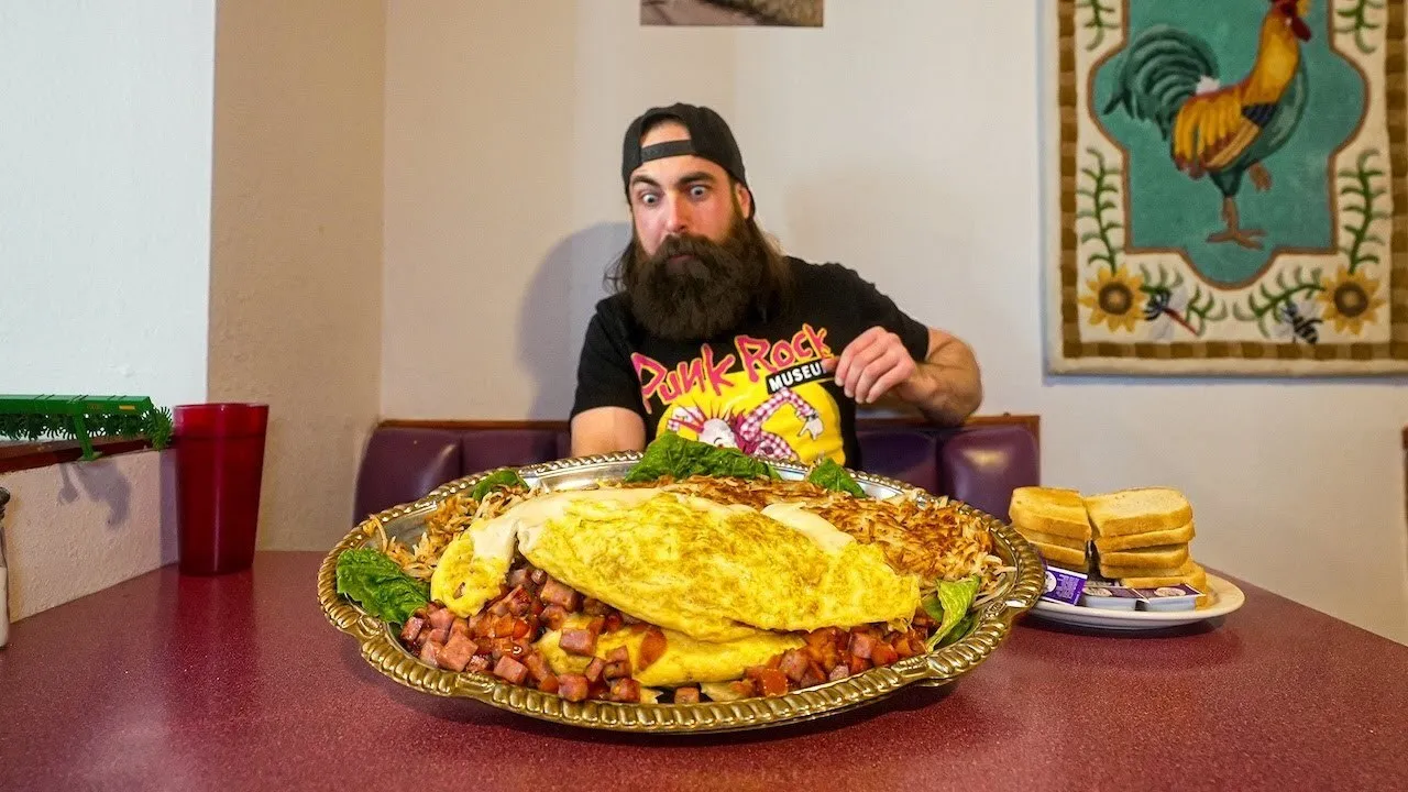 Thumbnail for the 24 Egg Omelette Challenge at Old Times Kafe video