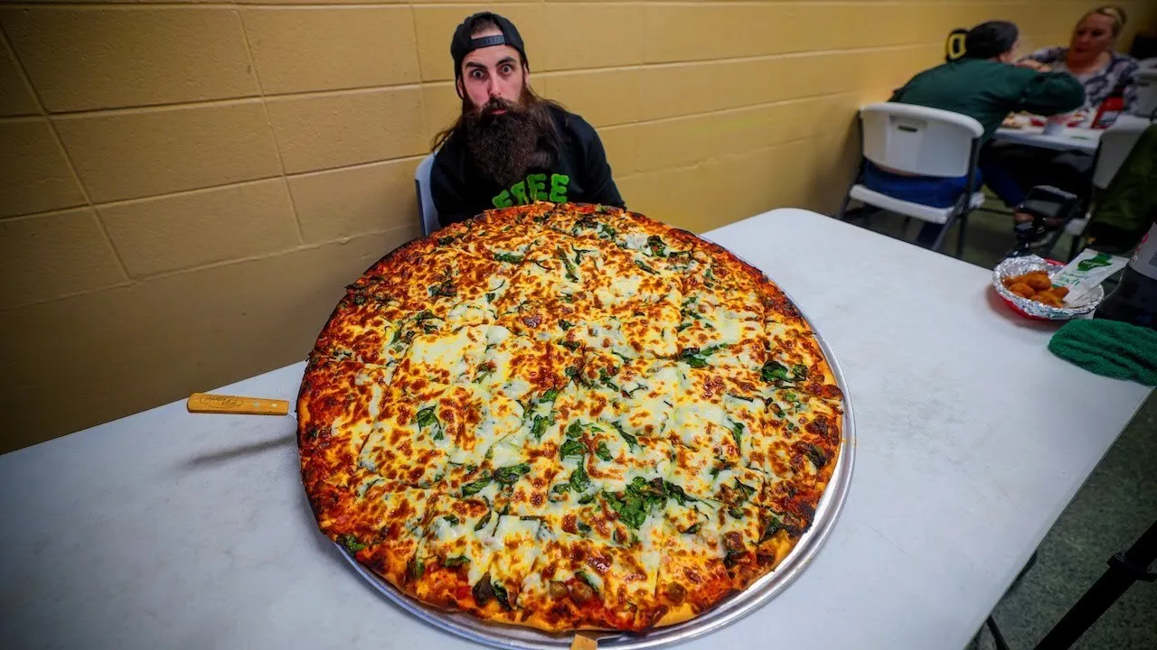 Thumbnail for the 11.5lb Pizza Challenge at Alvino's Pizza video