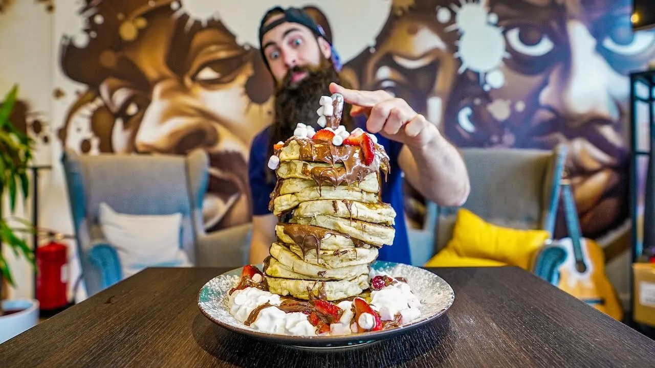Thumbnail for the 12 Stack Pancake Challenge at Coffee Rules Everything Around Me video