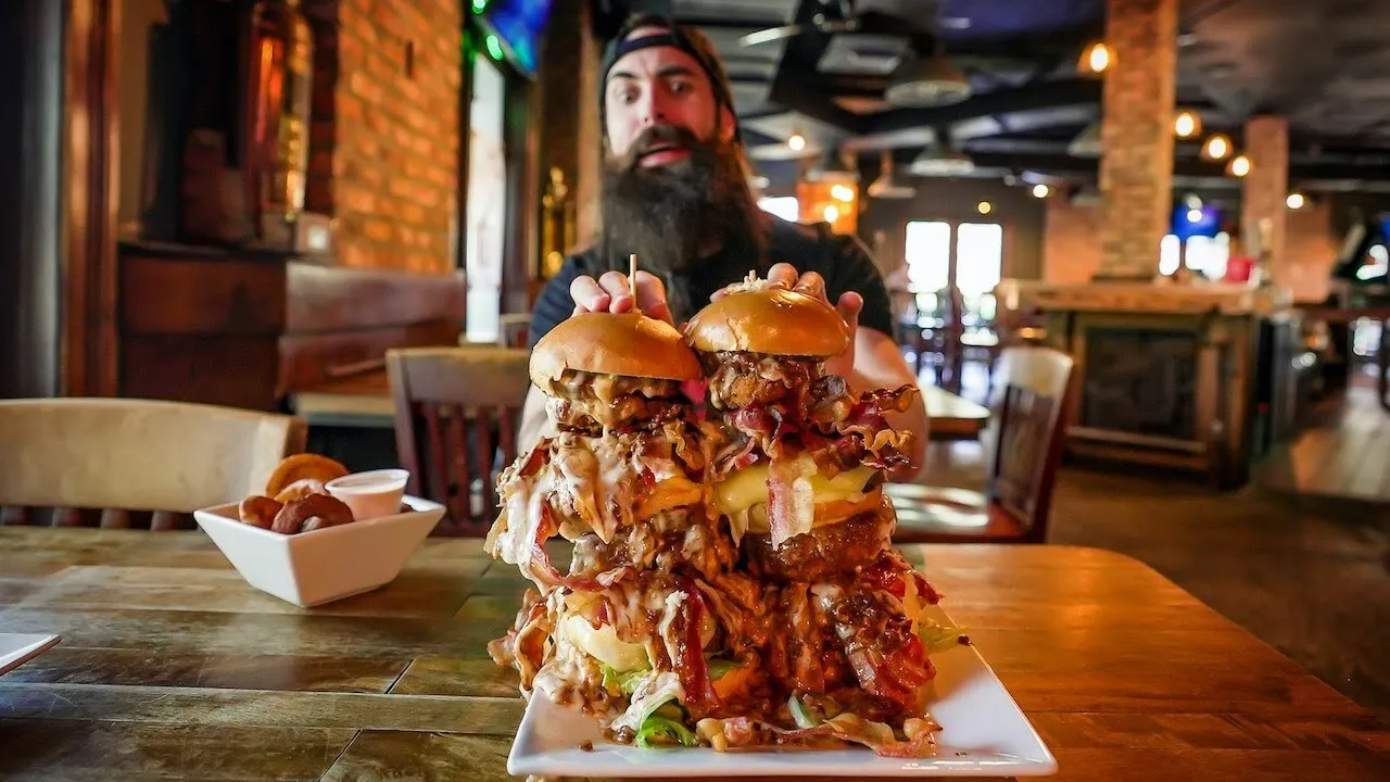 Thumbnail for the Twin Burger Tower Challenge at Teak Neighbourhood Bar & Grill video